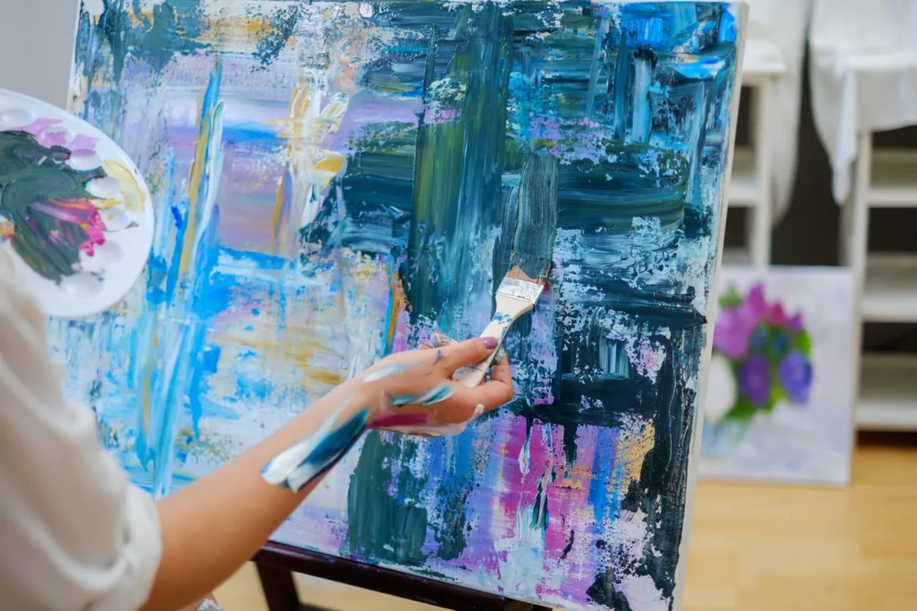 creative-painter-paints-a-colorful-picture-in-her-2026-01-09-13-29-23-utc