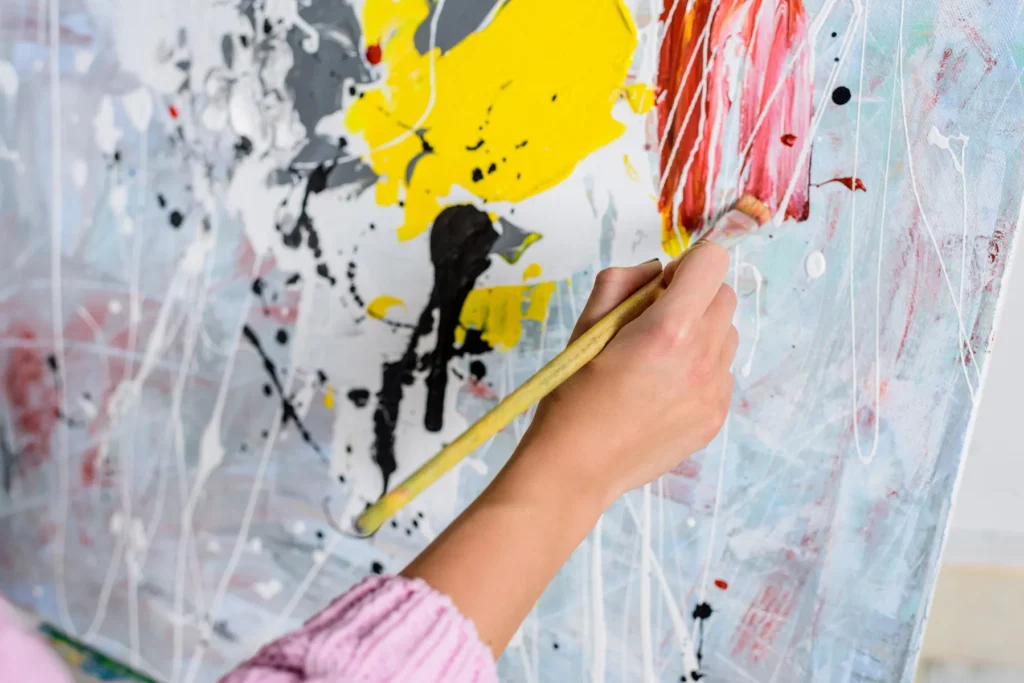 cropped-image-of-female-artist-painting-in-worksho-2026-01-06-00-27-37-utc