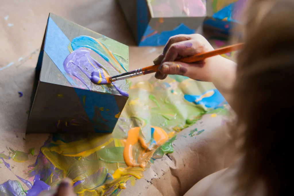 toddler-boy-painting-flower-pots-for-replanting-se-2026-01-05-04-53-45-utc